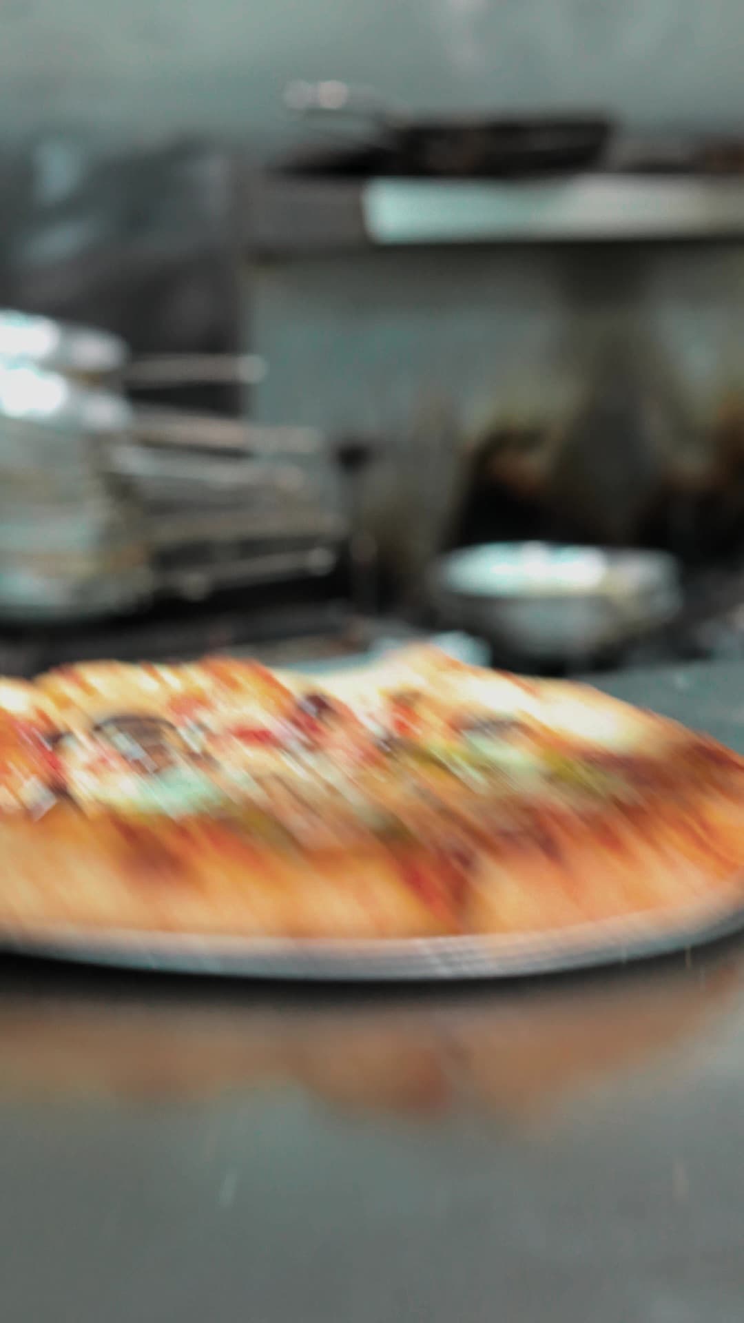 A pizza coming together in the La Bocca kitchen